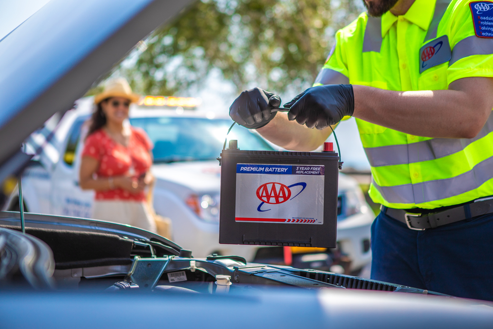 AAA Roadside Service Technician replaces battery in Member's car